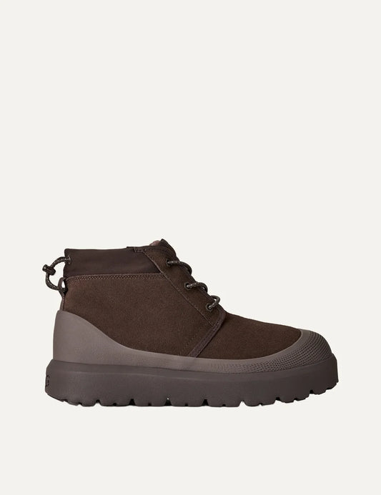 UGG Heritage Chukka dark brown waterproof suede ankle boots with elastic laces, reinforced toe and chunky rubber sole.
