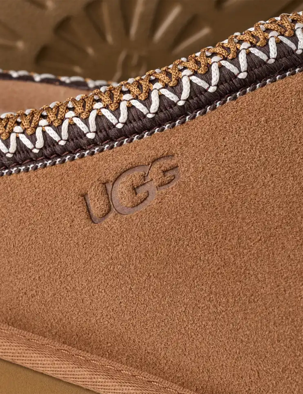 Men's UGG Tasman brown suede shoes with UGGbraid trim, 17mm sheepskin lining and Sugarcane EVA outsole detail