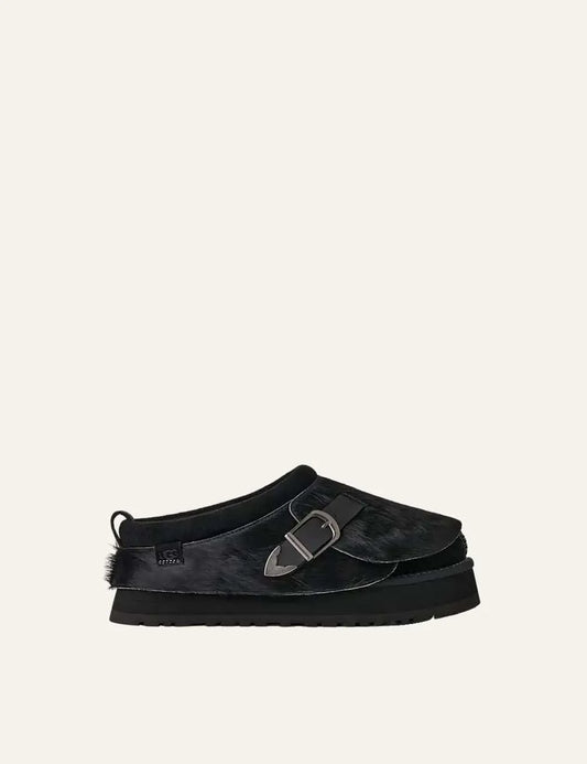 Unisex UGG Tazz Western black platform shoes with cow hair upper, suede details, leather strap, metal buckle and sheepskin lining