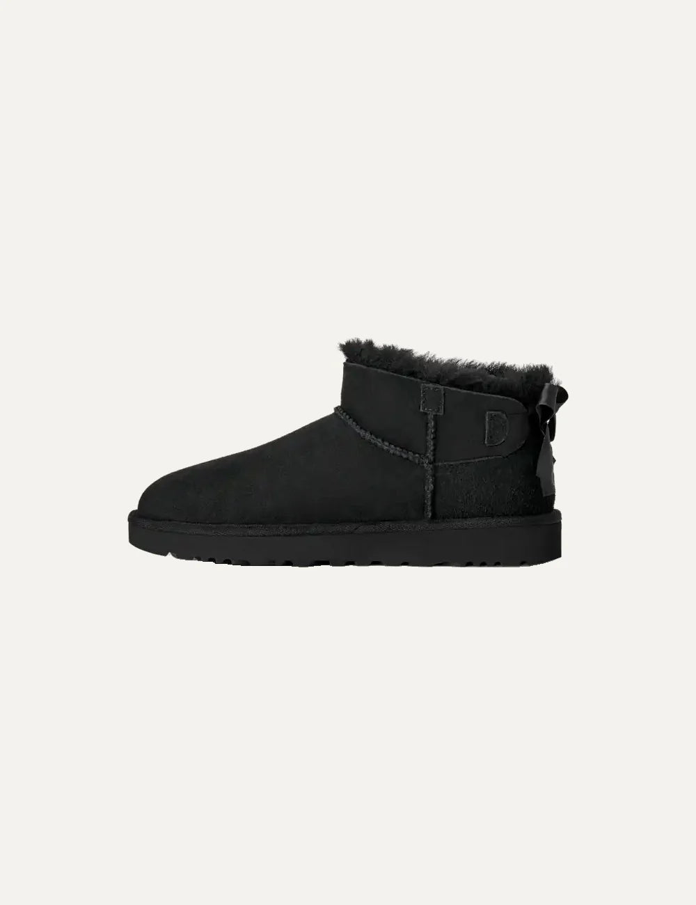 Women's UGG Bailey Bow Ultra Mini black boots with Twinface sheepskin, satin back bow and Sugarcane EVA sole side