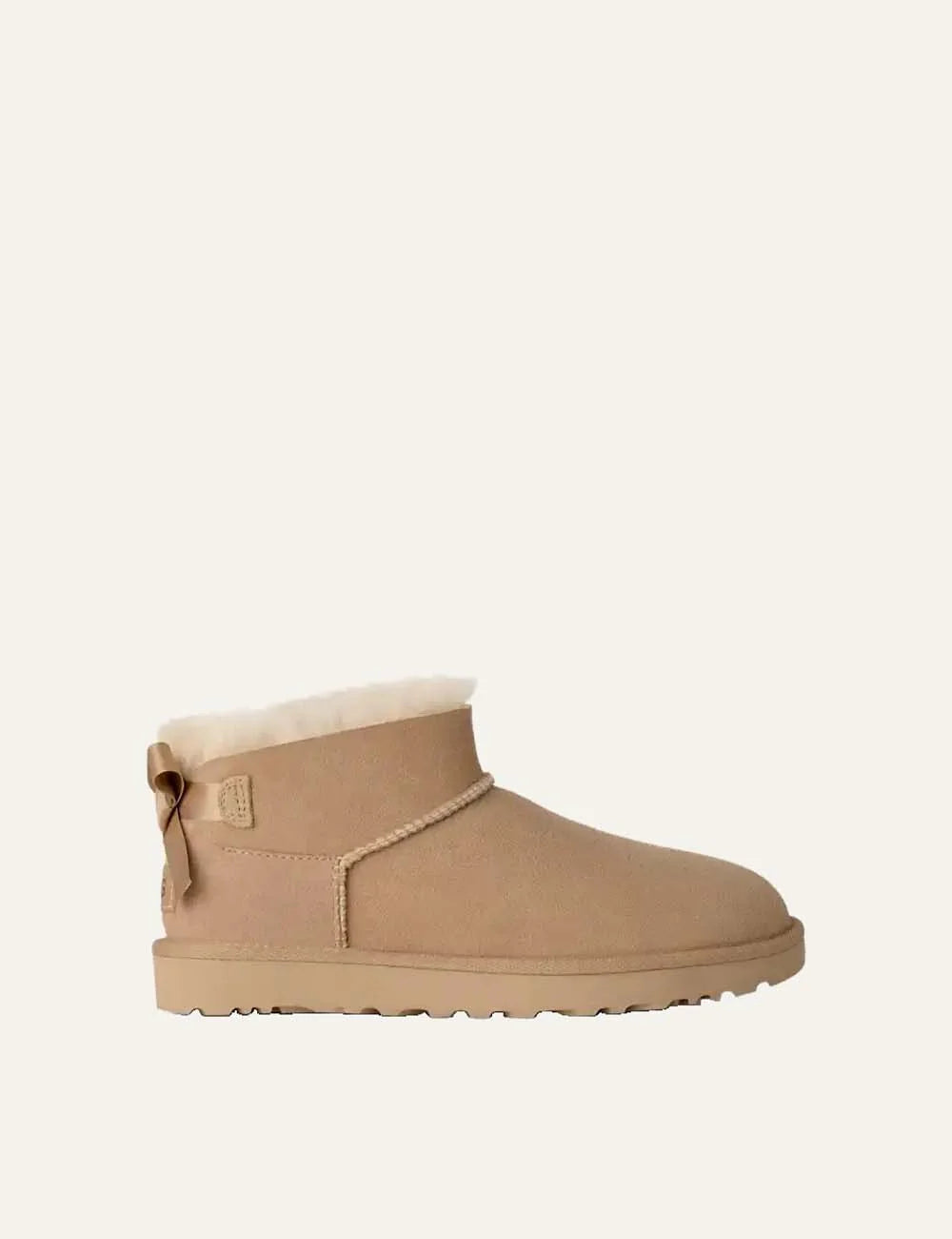 Women's UGG Bailey Bow Ultra Mini Sand boots with Twinface sheepskin, satin back bow and Sugarcane EVA sole