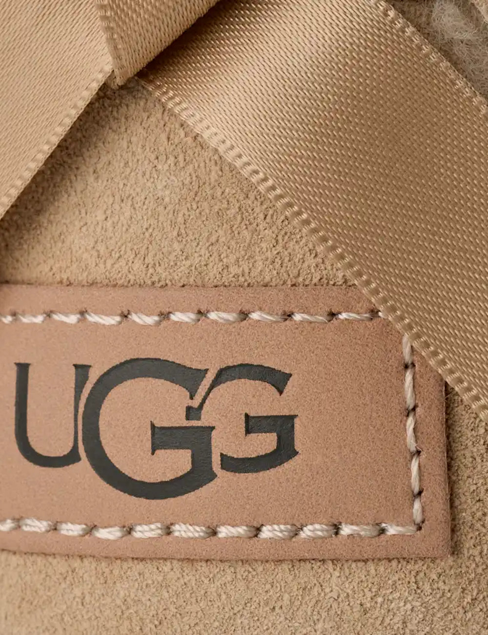 Women's UGG Bailey Bow Ultra Mini Sand boots with Twinface sheepskin, satin back bow and Sugarcane EVA sole logo