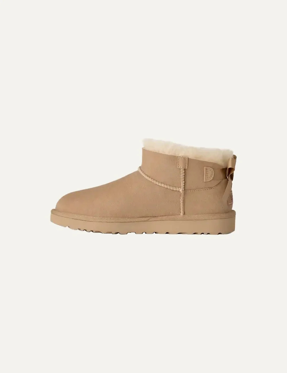 Women's UGG Bailey Bow Ultra Mini Sand boots with Twinface sheepskin, satin back bow and Sugarcane EVA sole profile