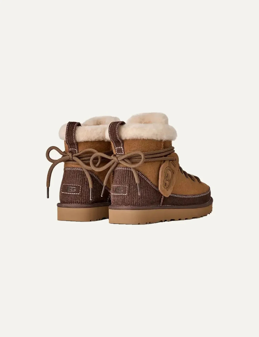Women's UGG Classic Heritage Lace-Up brown suede boots with laces, sheepskin trim, UGG logo charm, UGGplush lining and Sugarcane EVA outsole back