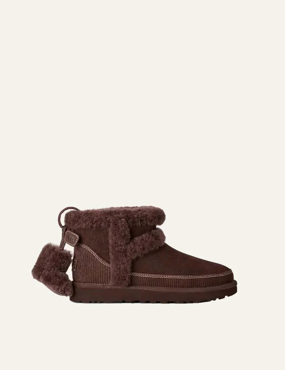 Women's UGG Classic Mini Heritage dark brown suede boots with sheepskin trim, removable boot charm, sheepskin lining and Sugarcane EVA outsole