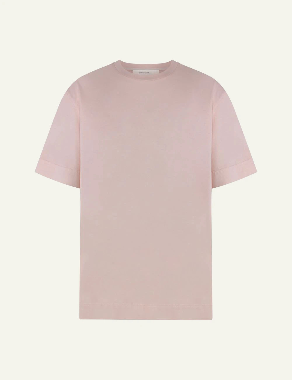 Umit Benan Paradiso t-shirt light pink oversized crewneck front flat view