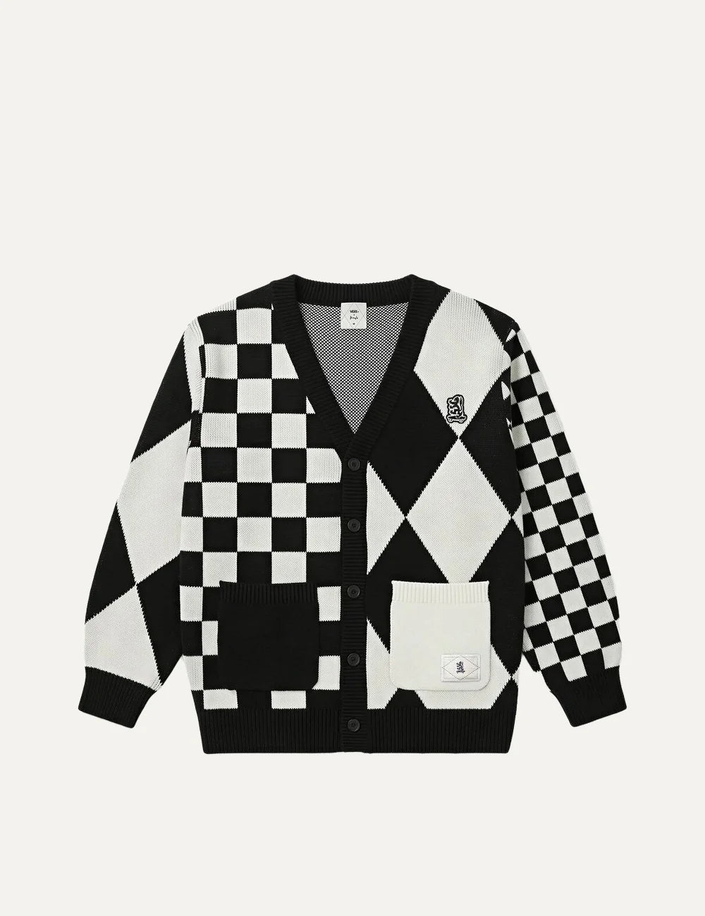 Vans men's black and white knitted cardigan with mixed checkerboard and argyle patterns, V-neck, button fastening, two front pockets and embroidered chest logo.