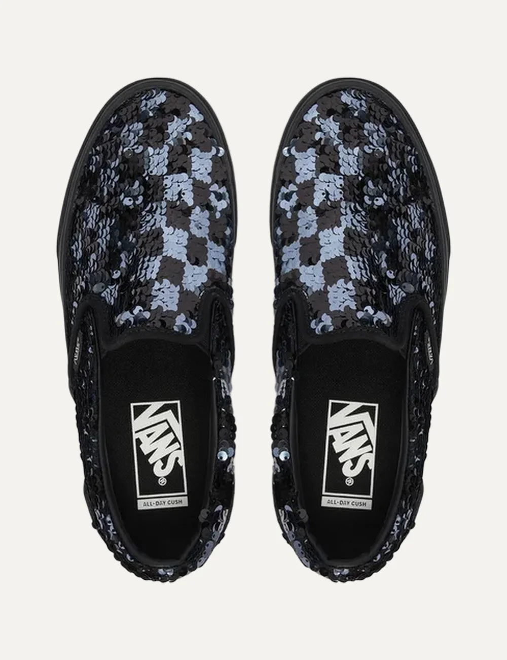 Vans Classic Slip-On women's black sneakers with black and silver sequins, elastic side panels and black rubber sole pair top view