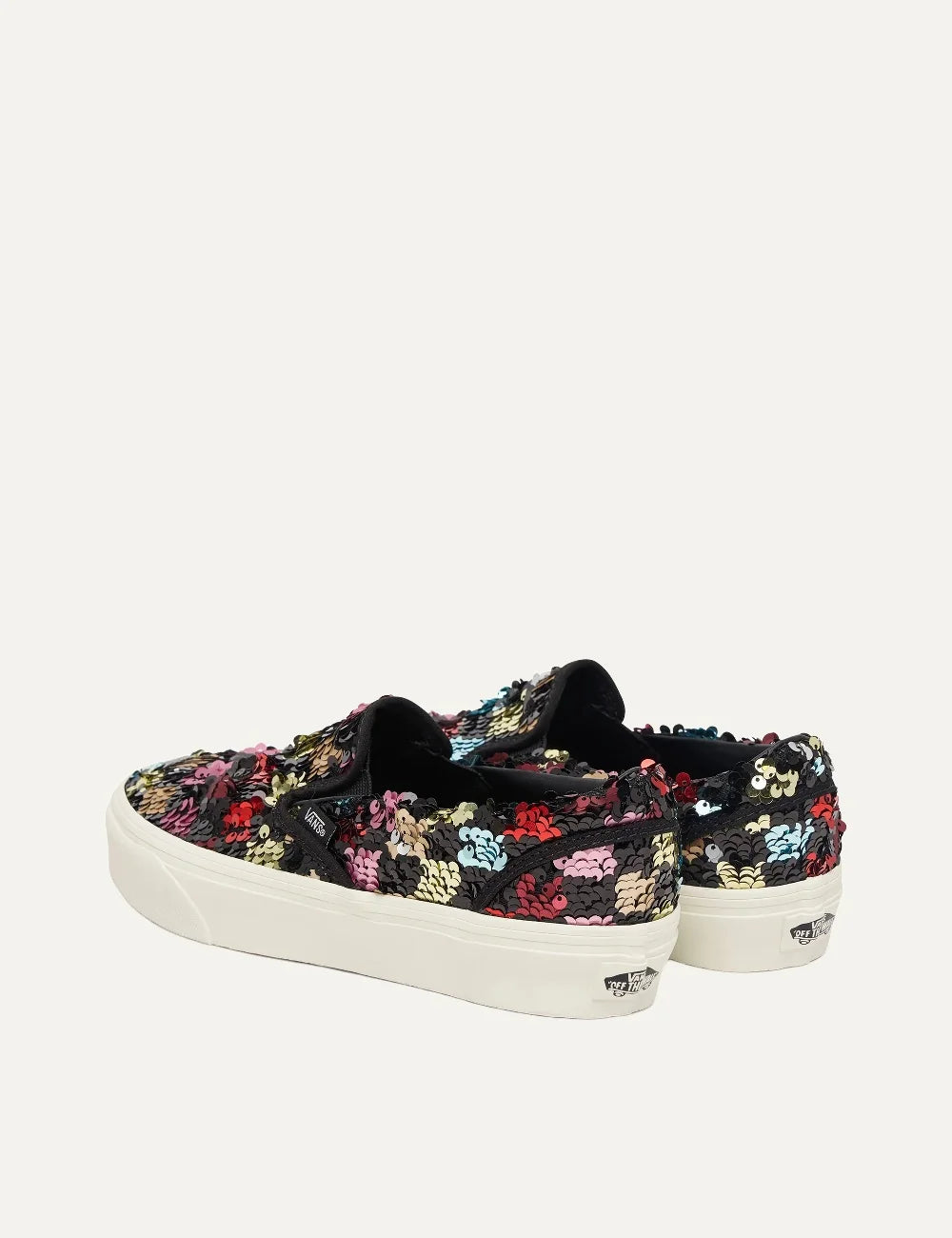 Vans Classic Slip-On women's sneakers in black with multicolored sequins, elastic side panels and white rubber sole back view