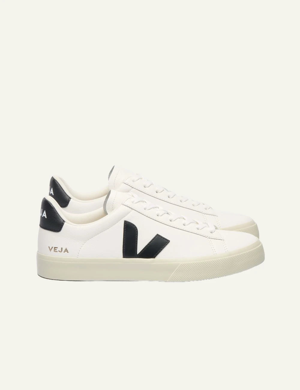 Women's Veja white leather sneakers with black V logo profile