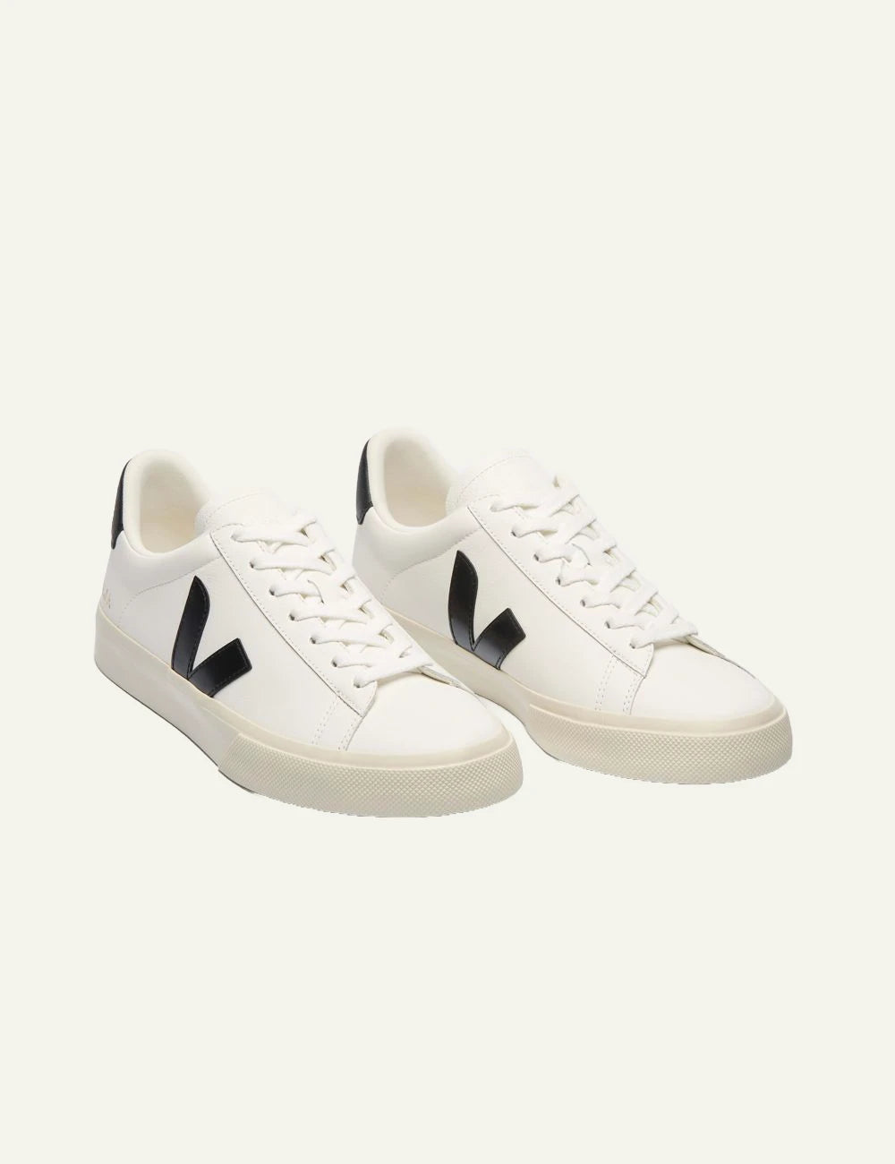 Women's Veja white leather sneakers with black V logo front