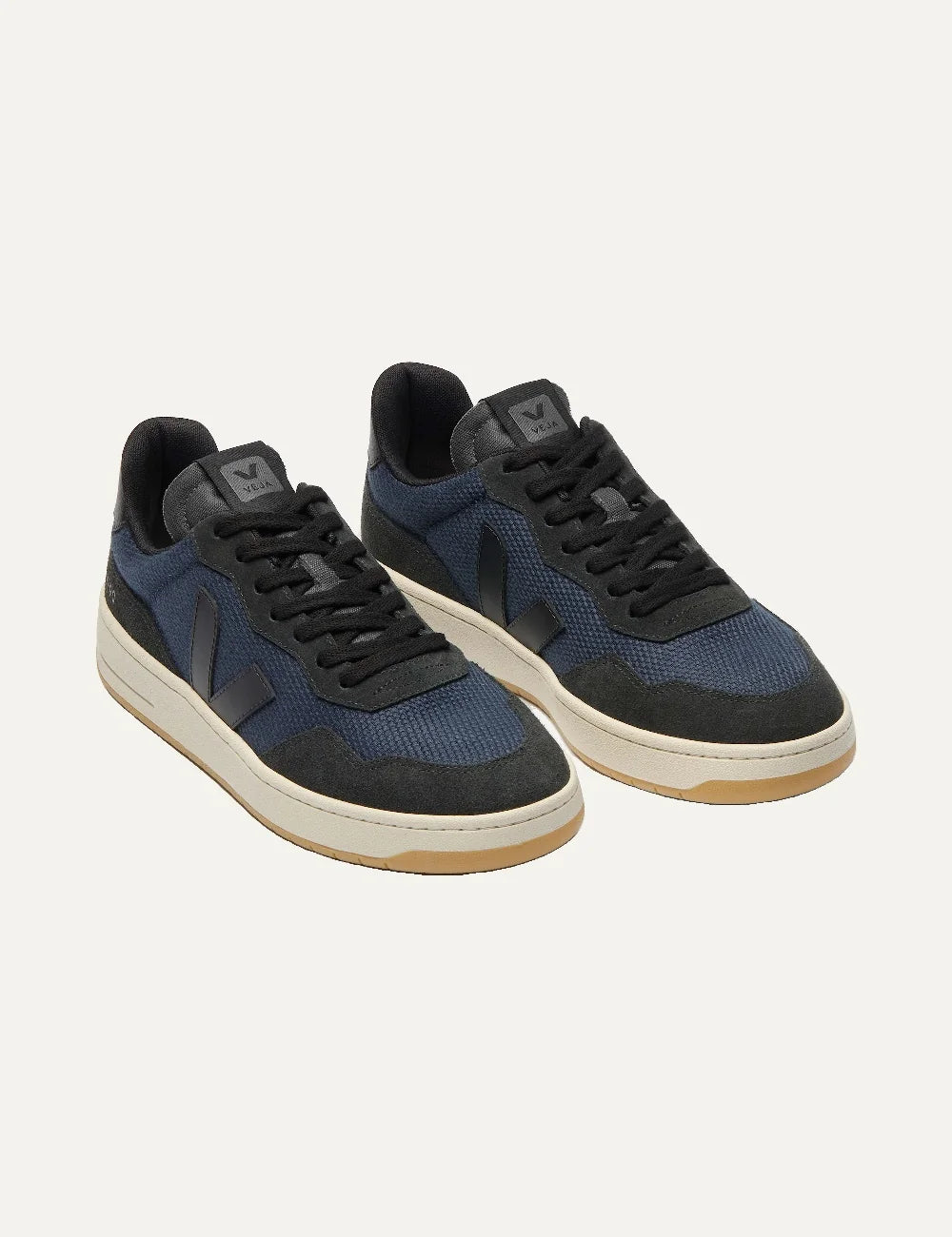 VEJA women's V-90 dark blue mesh sneakers with black suede panels, tonal V logo and cream gum rubber sole angled