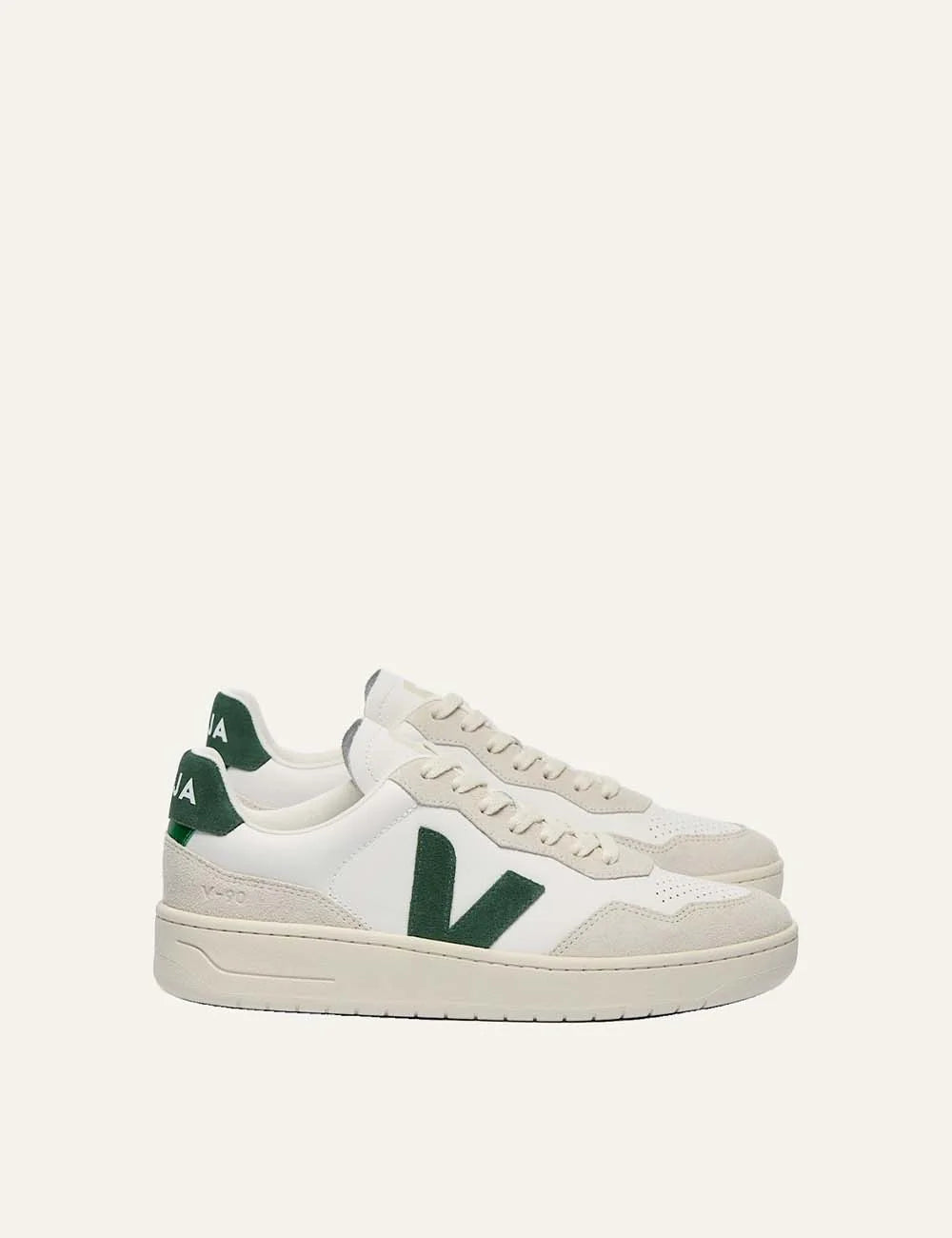 VEJA women's V-90 white leather sneakers with ecru suede panels, green V logo and cream rubber sole.