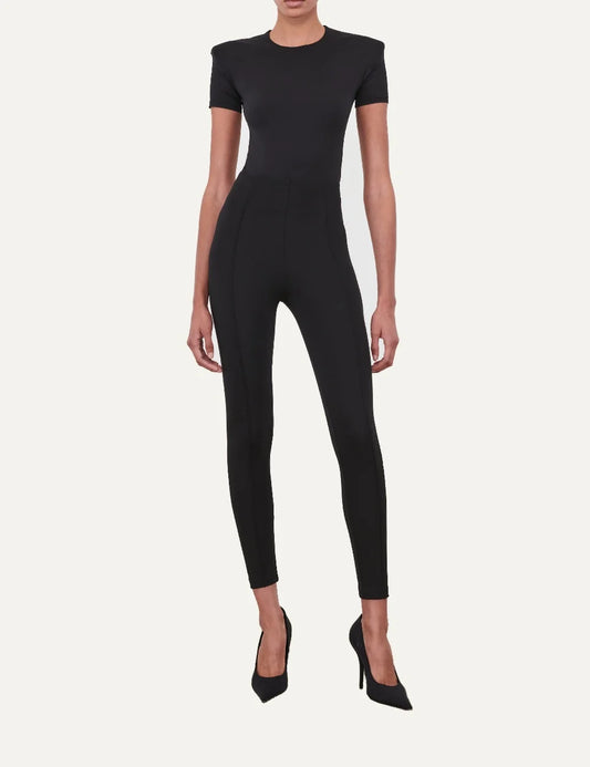 Wardrobe NYC women's black Bonded Legging in Italian technical stretch jersey featuring a high-rise bonded waistband, matte finish, slim fit and front and back pintuck seams.