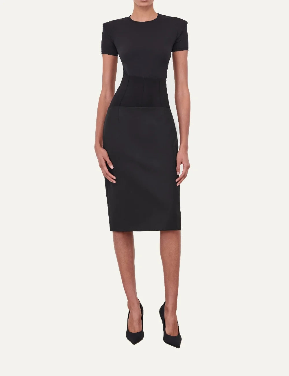Wardrobe NYC women's Blade Cap Sleeve Bodysuit in black Italian stretch jersey with short sleeves, padded shoulders, round neckline and fitted silhouette.