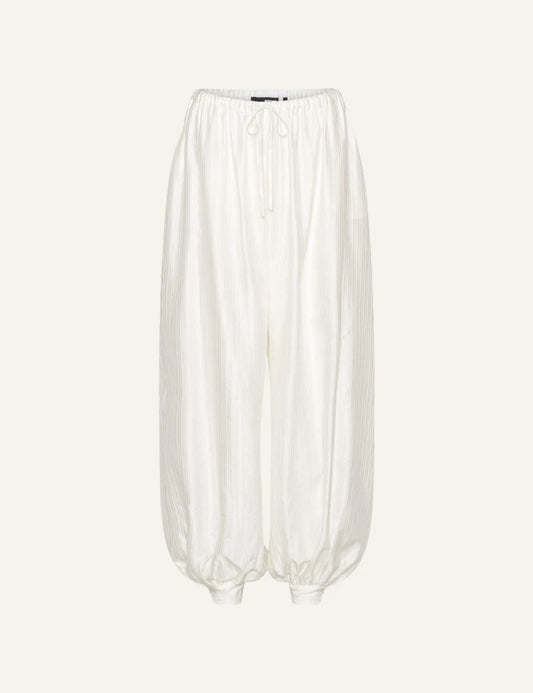 White viscose blend balloon pants with elastic waistband front flat view