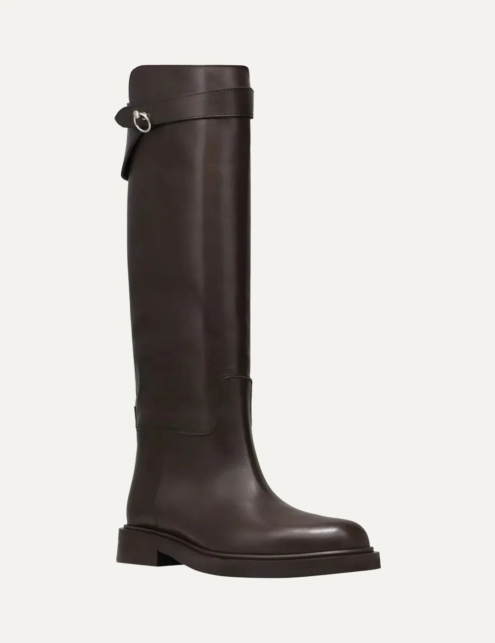 Women's dark brown smooth leather knee-high boots with round toe, low flat heel, asymmetric shaft and silver-tone ring strap detail angled