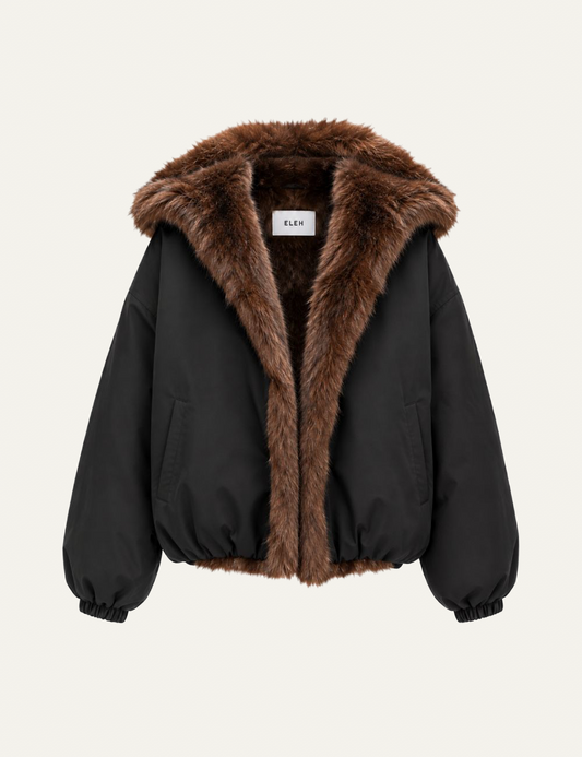 Women's Eleh black oversized hooded jacket with brown faux fur trim, voluminous sleeves and elasticated hem.