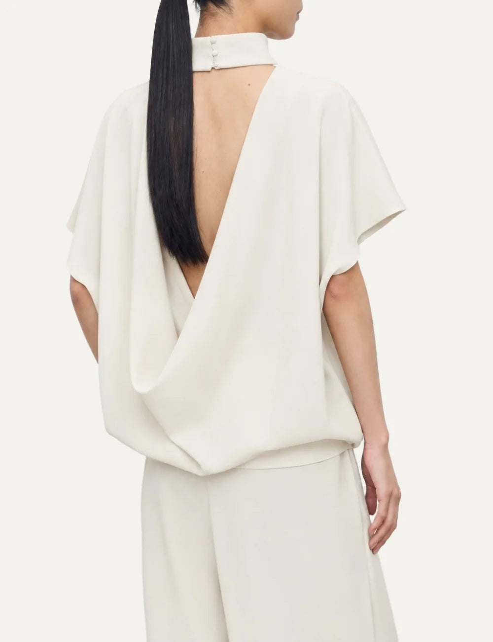 Women's Eleh ecru high-neck blouse with loose short sleeves, flowing draped silhouette and deep V-back opening back
