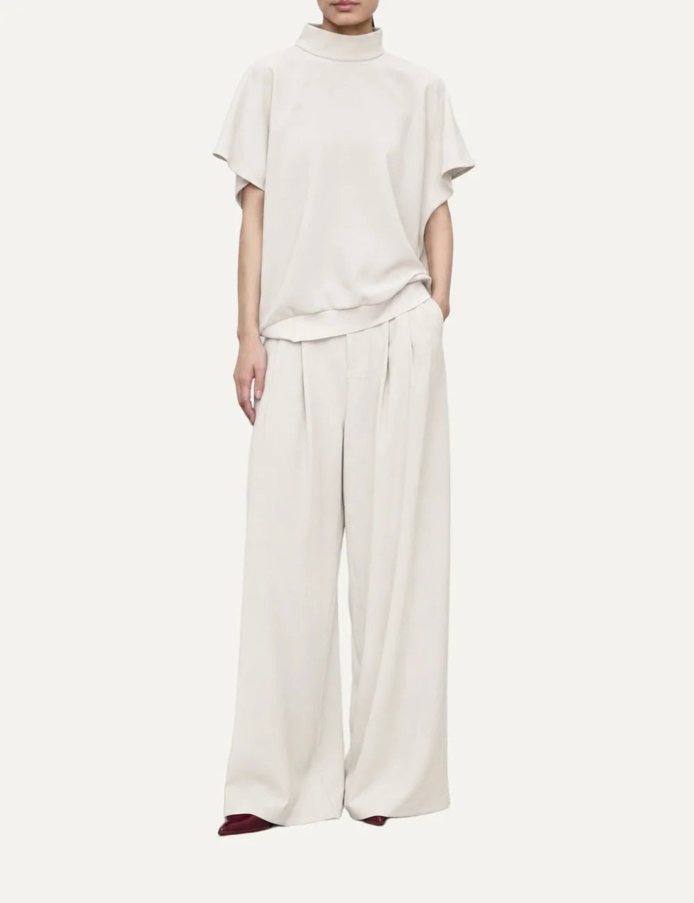 Women's Eleh ecru high-waisted wide-leg trousers with front pleats, belt loops and flowing silhouette full body