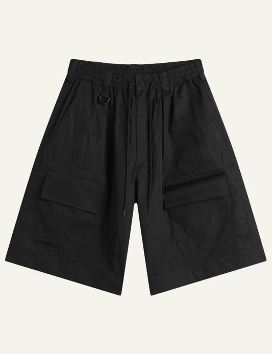 Y-3 black cargo shorts lightweight tech fabric front flat view