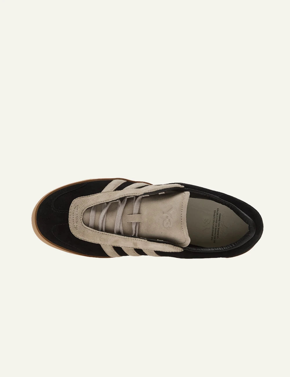 Y-3 black suede sneakers with beige stripes gum sole top view