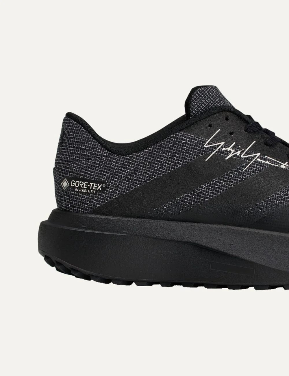 Unisex Y-3 EVO SL ATR GTX black sneakers with textile and synthetic upper, GORE-TEX Invisible Fit, LightstrikePro cushioning, rubber outsole and Yohji Yamamoto signature detail