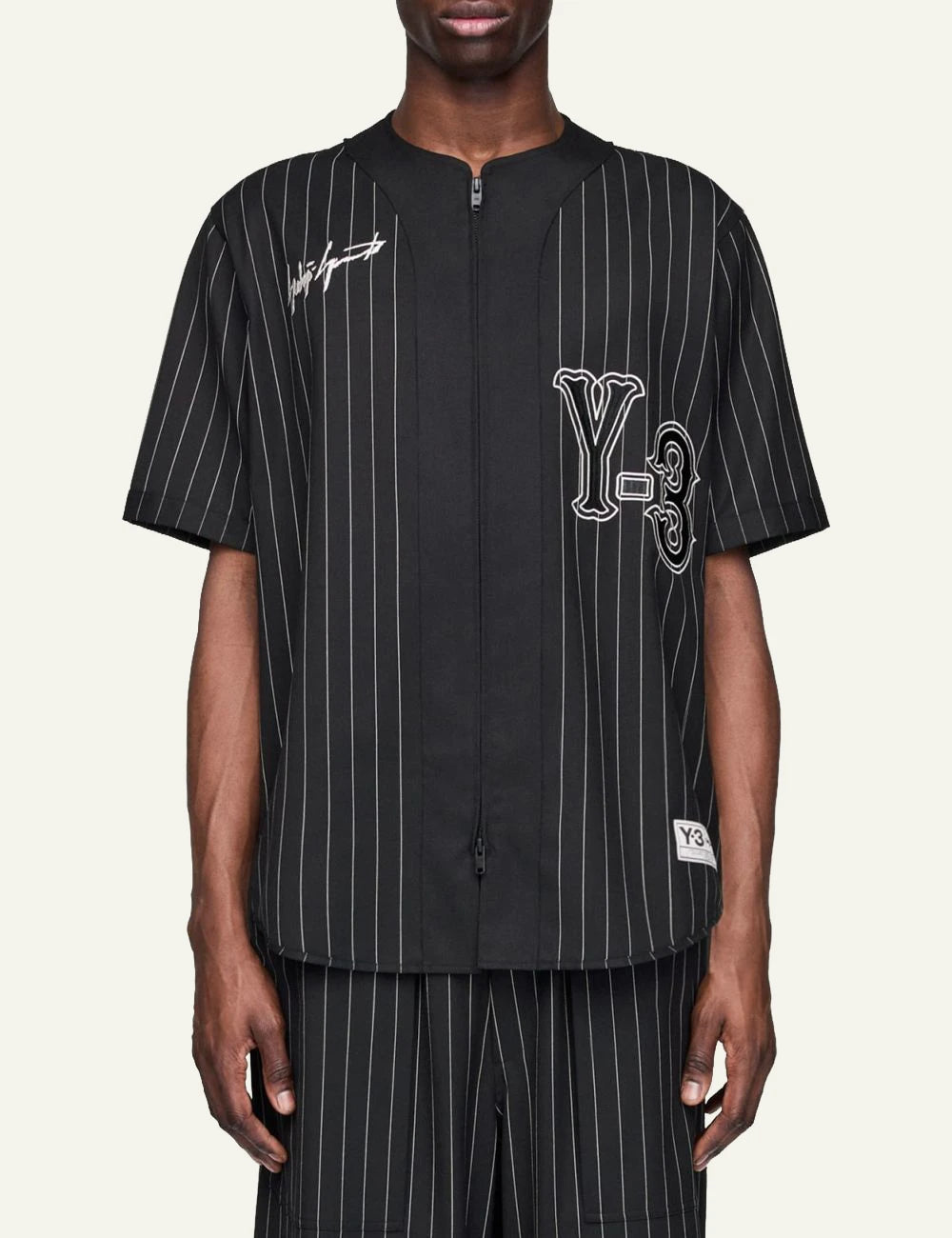 Y-3 pinstripe baseball jersey black short sleeve zip front model view