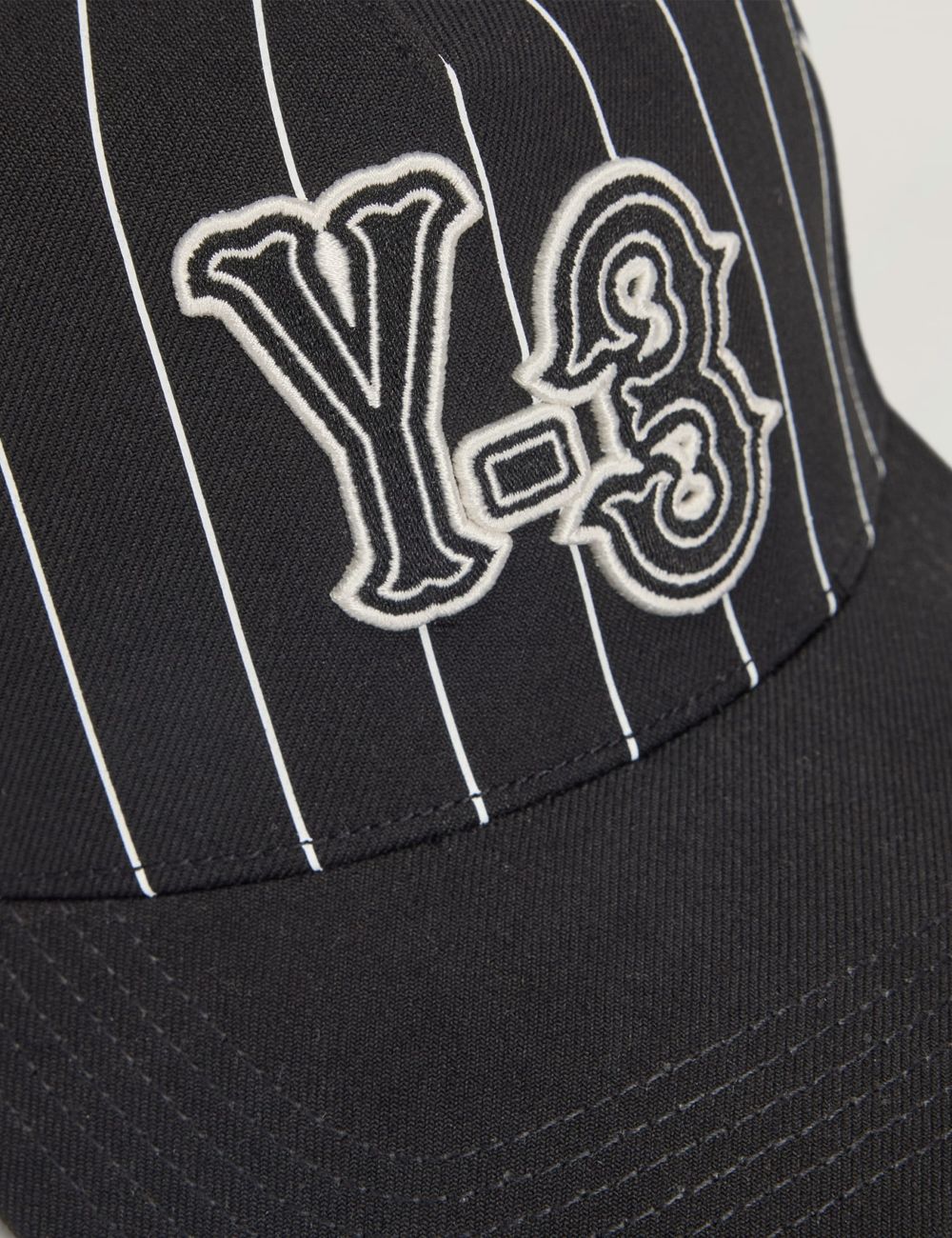 Y-3 Pinstripe cap black baseball hat embroidered logo detail view