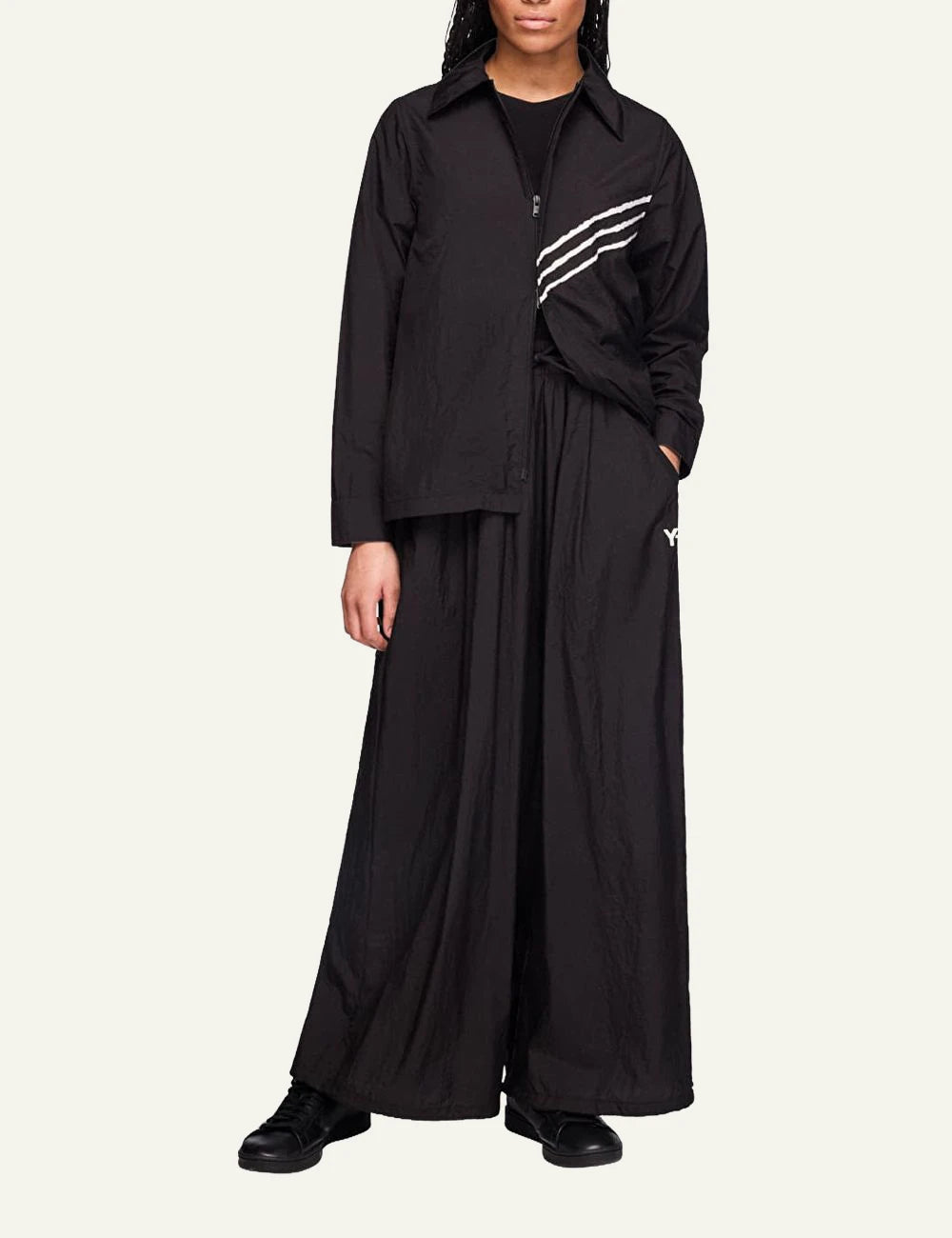 Y-3 wide leg track pants black three stripes front model view