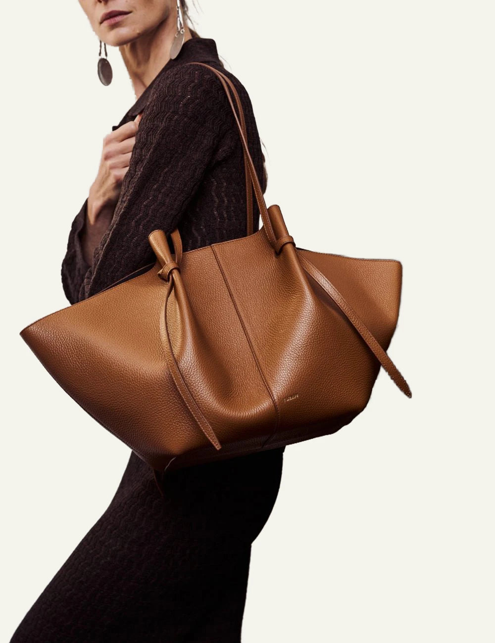 Yuzefi Large Mochi hazel leather tote bag hold by model
