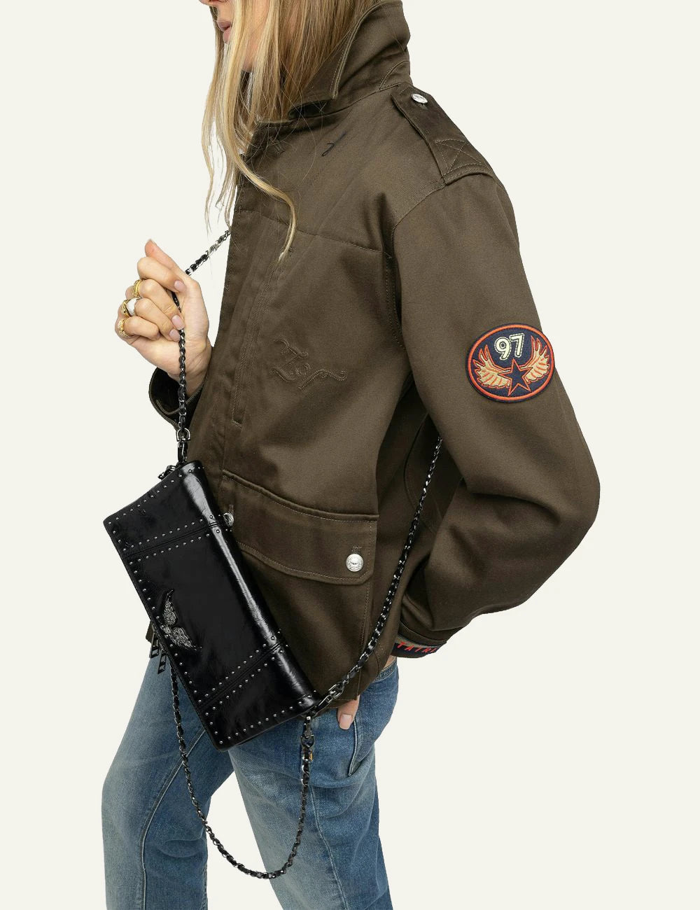 Zadig Voltaire studded clutch black leather wings rhinestone front model view