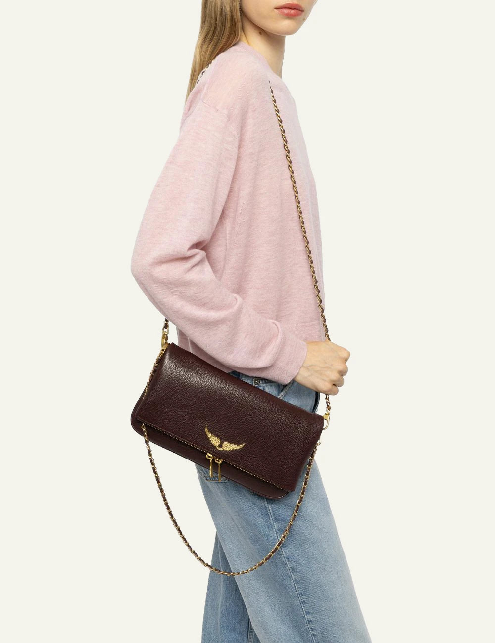 Zadig &amp; Voltaire women's deep purple grained leather Rock clutch worn by model