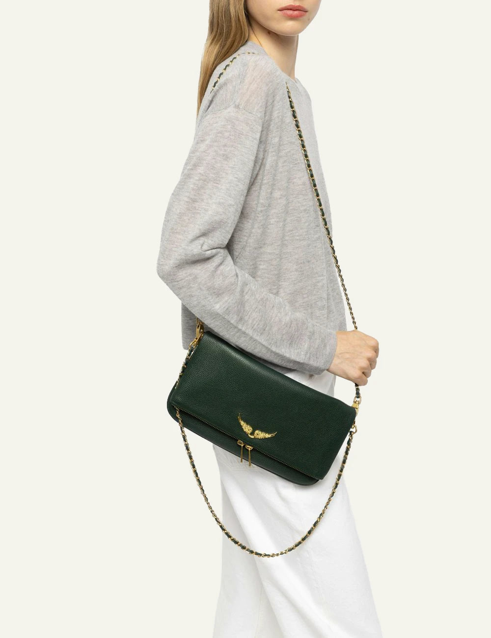 Zadig &amp; Voltaire women's emerald green grained leather Rock clutch worn by model